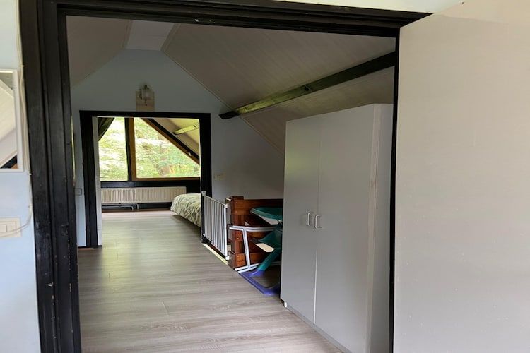 Een slaapkamer van Bungalow 69 in Stramproy