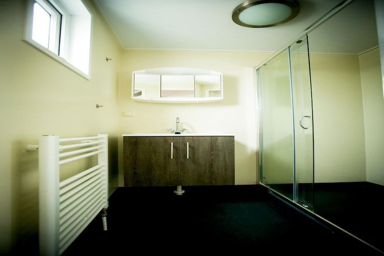 De badkamer van Recreatiepark Duinhoeve 14 in Udenhout