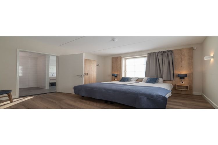 Een slaapkamer van Zeeuwse Parel luxe Appartement 4 pers 2 bdk in Colijnsplaat