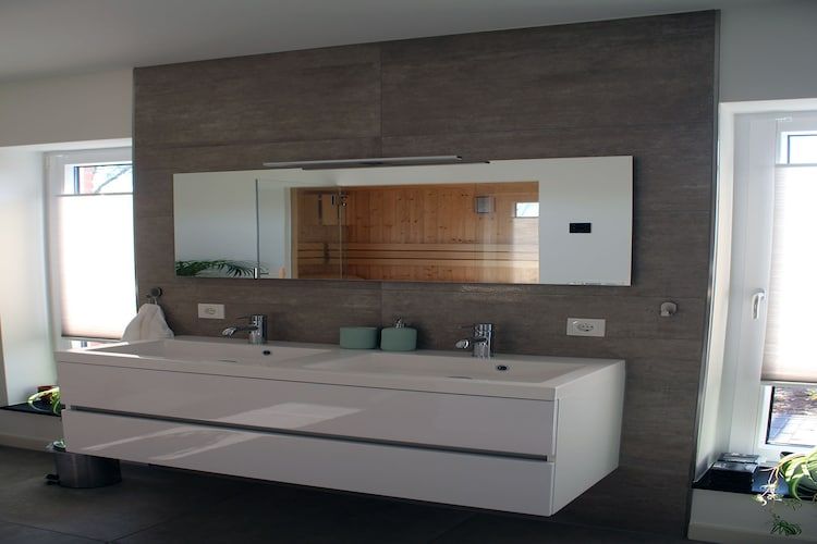 De badkamer van Villa Grenszicht in Megchelen