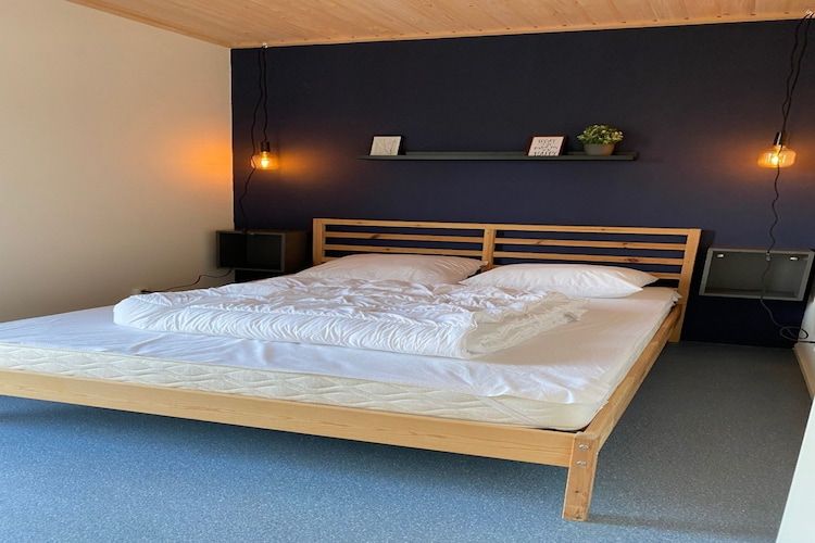 Een slaapkamer van Chalet Doutzen in De Veenhoop