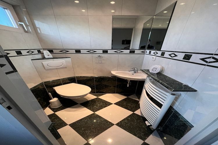 De badkamer van Fijne bungalow in Makkum in Friesland