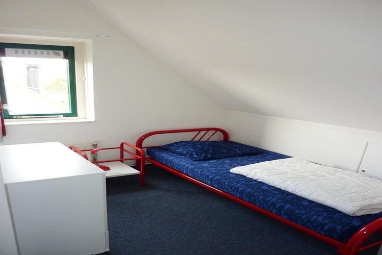 Een slaapkamer van Schoneveld 132 Zeemeeuw Breskens in Breskens