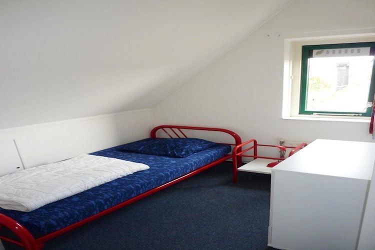 Een slaapkamer van Schoneveld 132 Zeemeeuw Breskens in Breskens