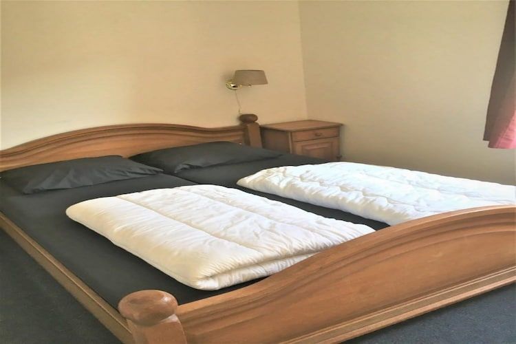 Een slaapkamer van Schoneveld 146 Zeemeeuw Breskens in Breskens