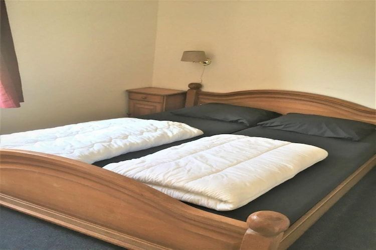 Een slaapkamer van Schoneveld 146 Zeemeeuw Breskens in Breskens