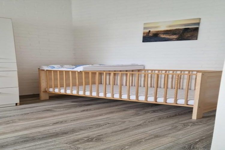 Een slaapkamer van Schoneveld 157 Duinroos Breskens in Breskens
